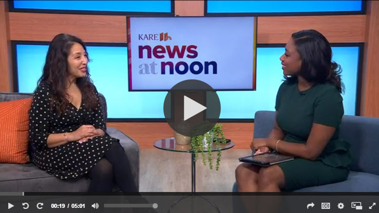 Dr. Gigi Chawla and Kare 11 reporter sitting in chairs