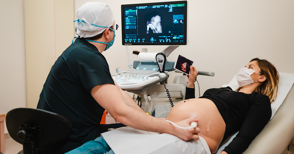 two people looking at ultrasound