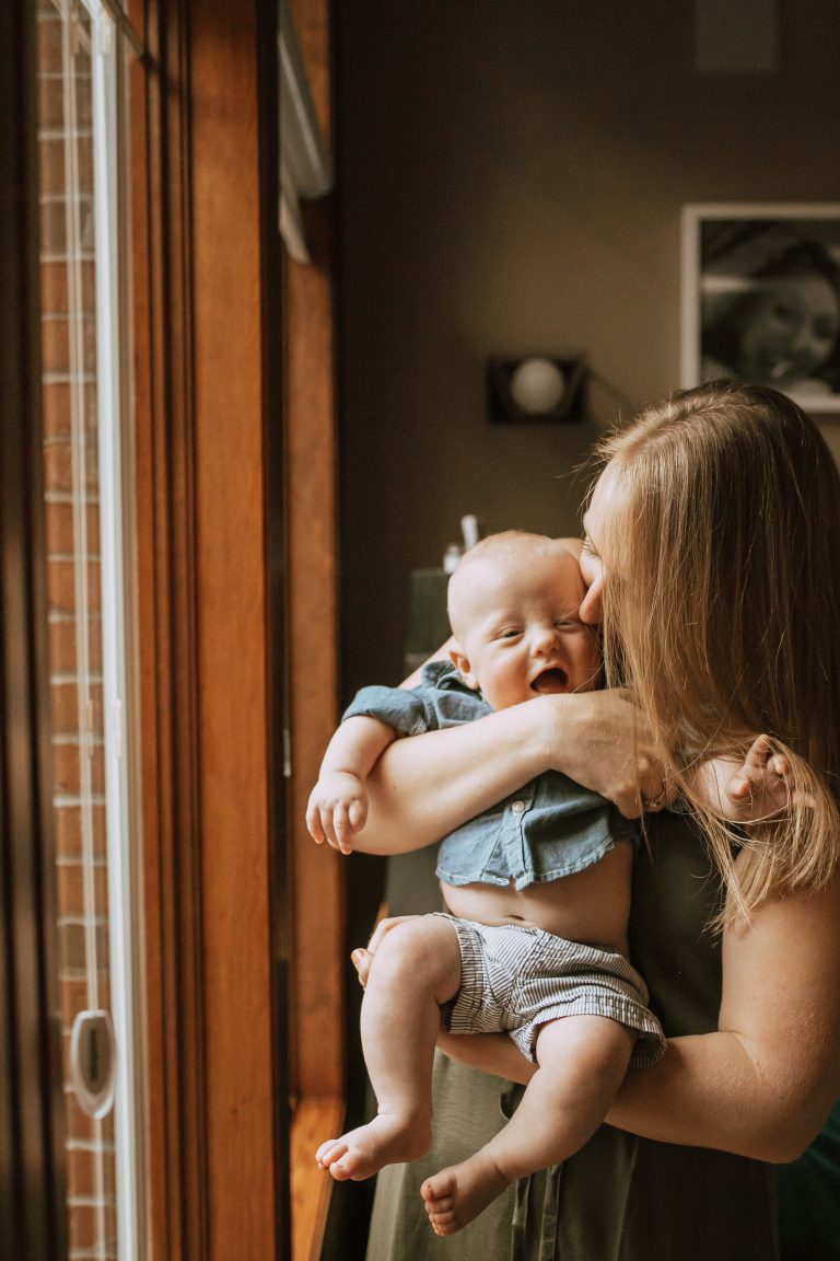 Dr. Amanda Calvin holding her son, Finn