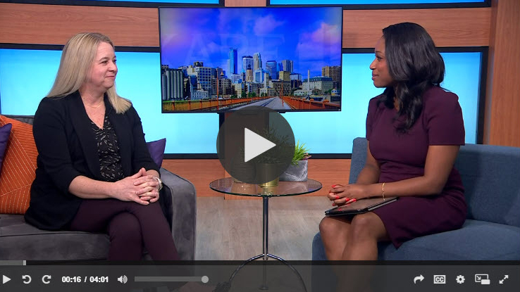 Dr. Lisa Howley with reporter on KARE-11