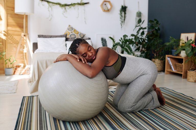 Using a birthing ball for labor and delivery